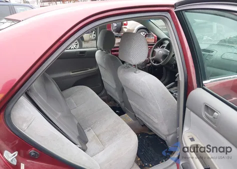 2003 Toyota Camry Le from USA, damaged, VIN 4T1BE32K13U189342